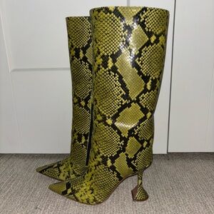 Amina Muaddi python boots.